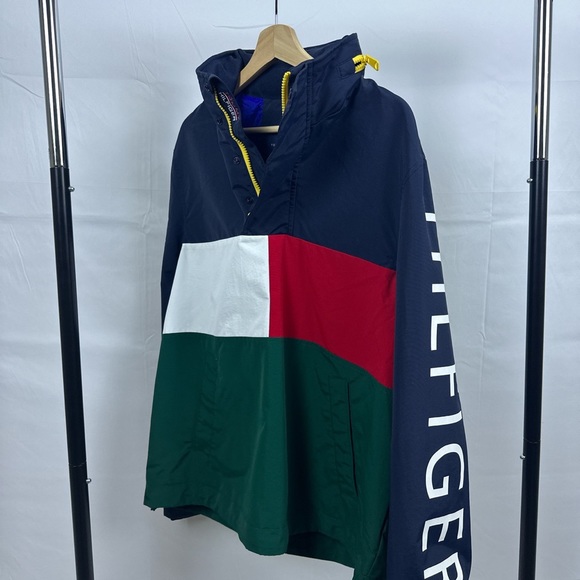Tommy Hilfiger Quarter-Zip Windbreaker. Includes hide-able (zip-in) hood. - Picture 2 of 5